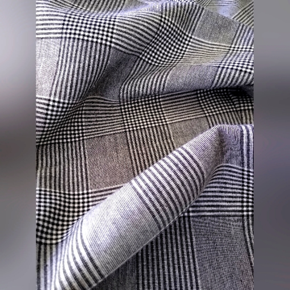 Wide leg tweed-like slacks.